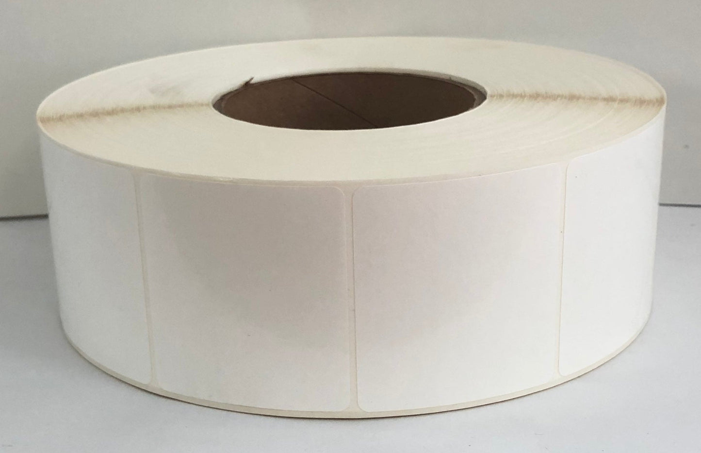 etiquettes-rive-sud,Étiquettes 2.30" X 2.125" polypro transfert thermique en rouleau sur core 3"